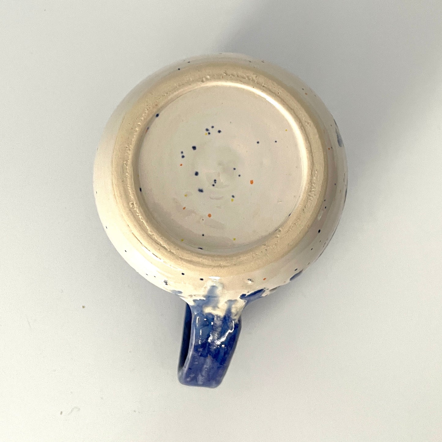Deep blue and white speckled mug
