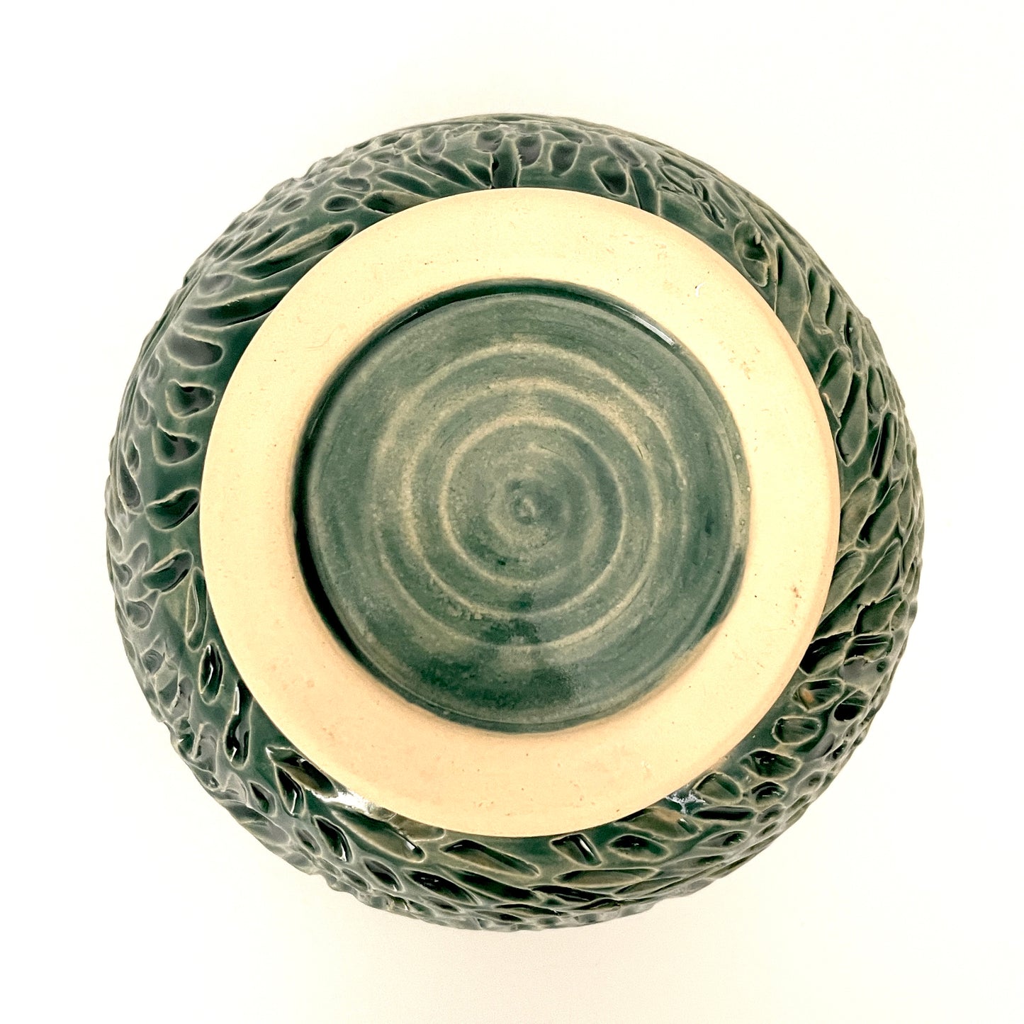 Deep green, low carved vase