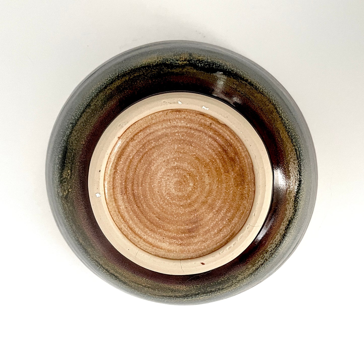 Large ceramic serving bowl in multicolor stripes and tones