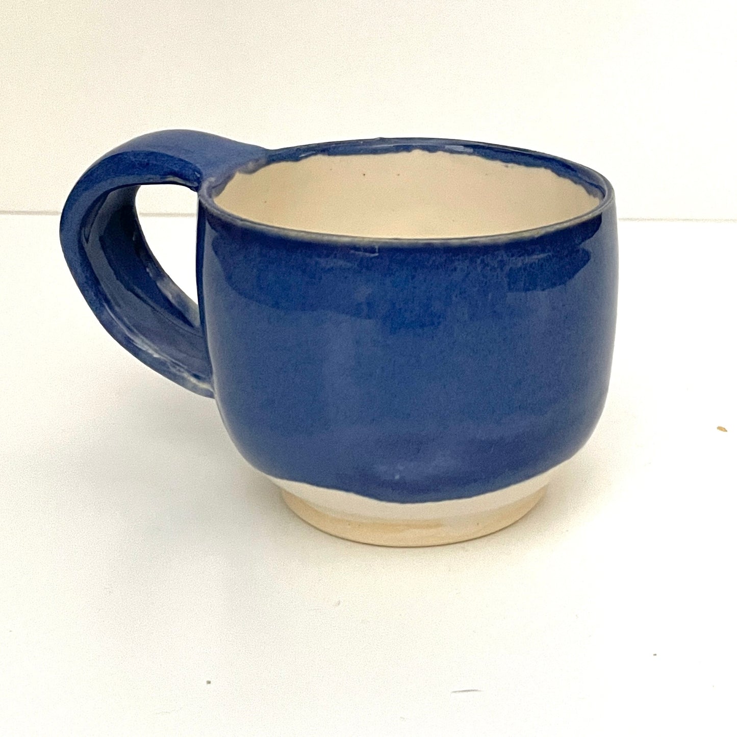 Deep blue and white espresso or tea cup