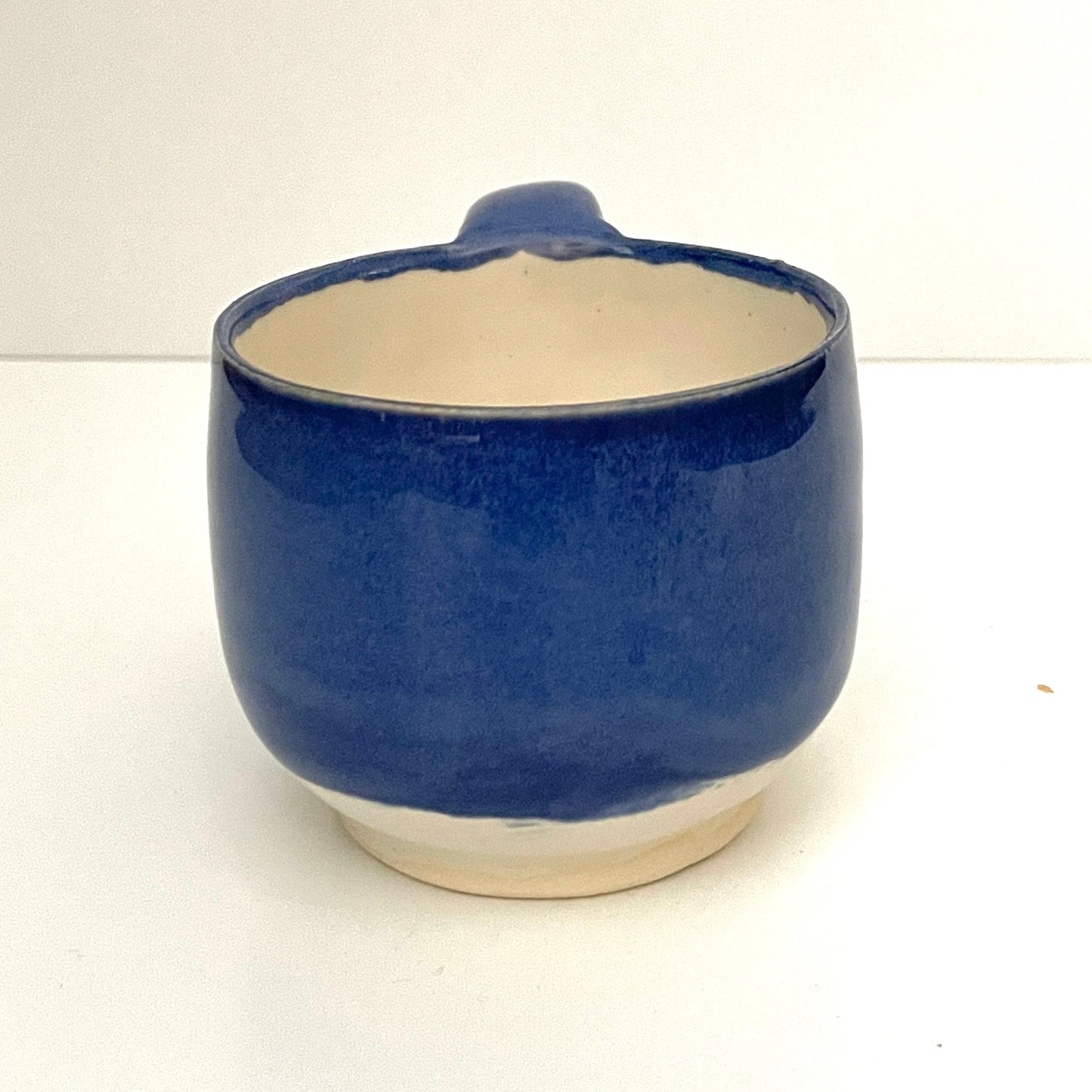 Deep blue and white espresso or tea cup