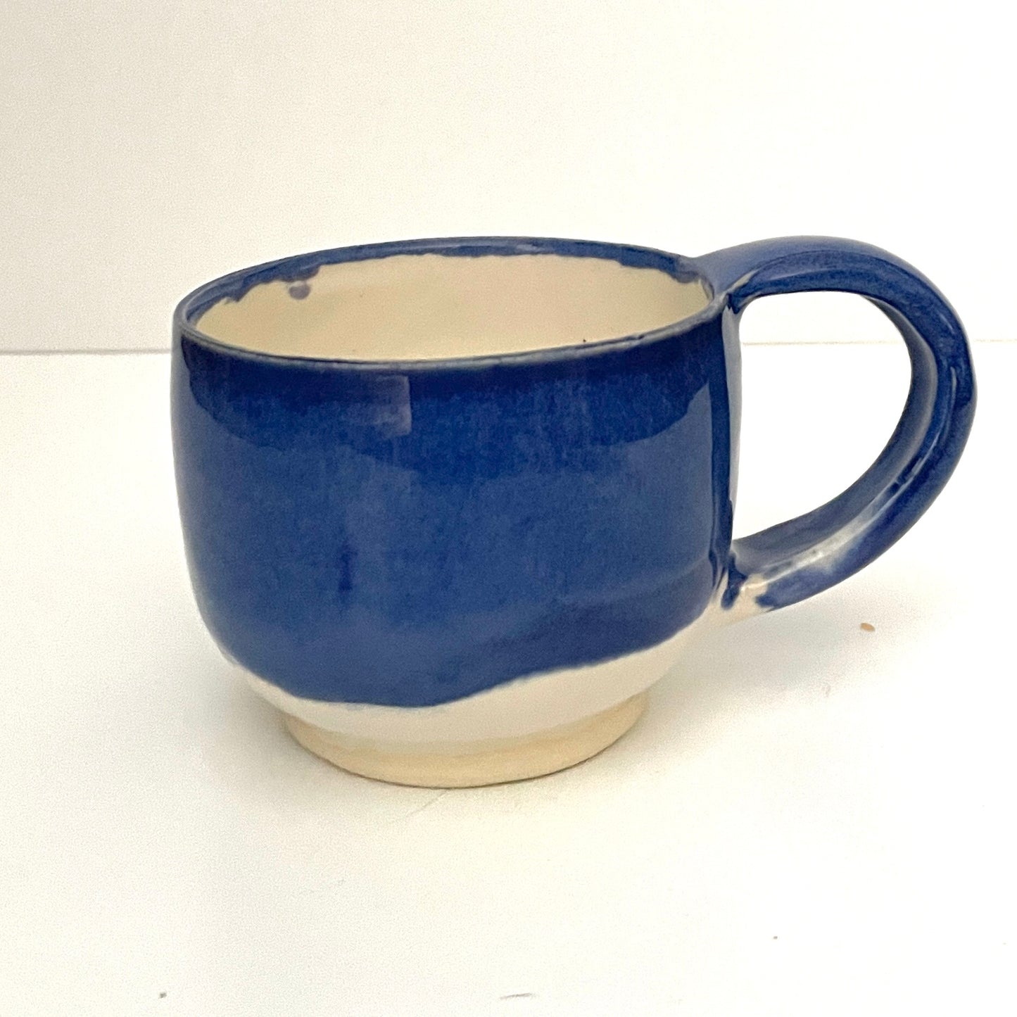 Deep blue and white espresso or tea cup