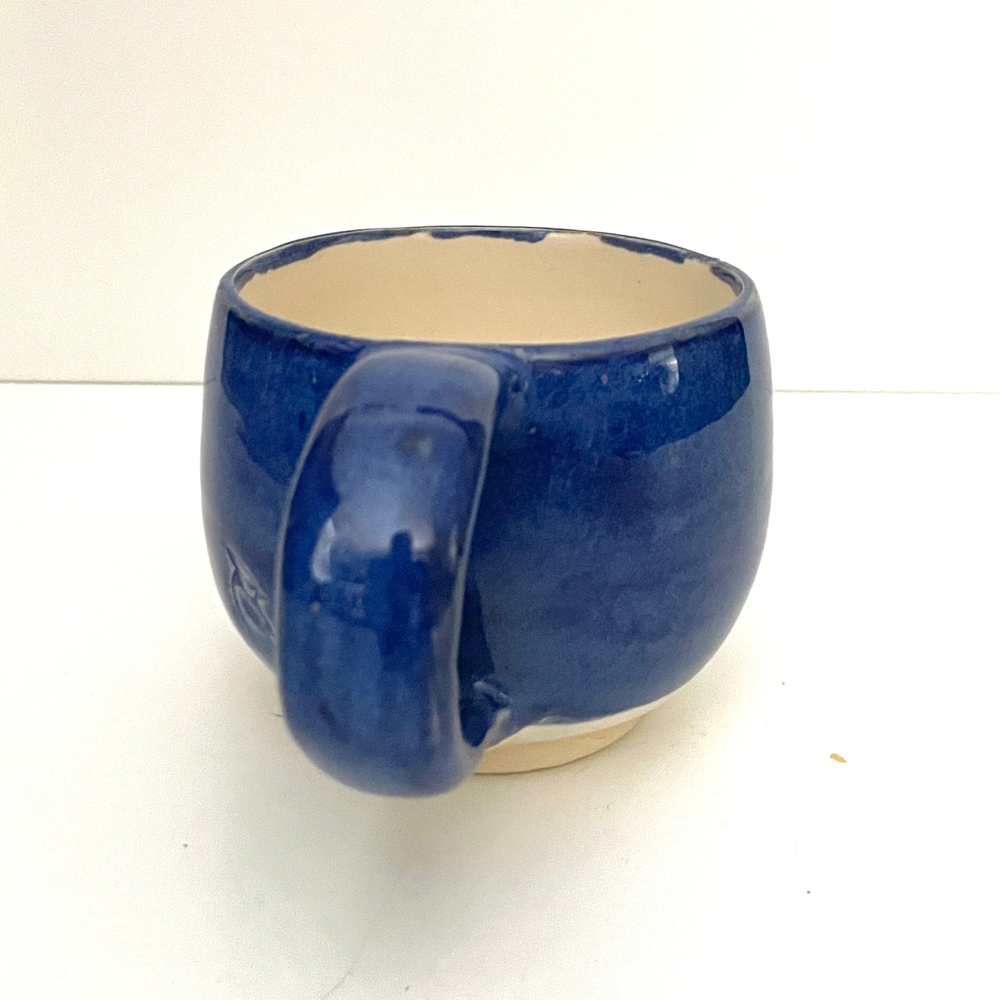 Deep blue and white espresso or tea cup