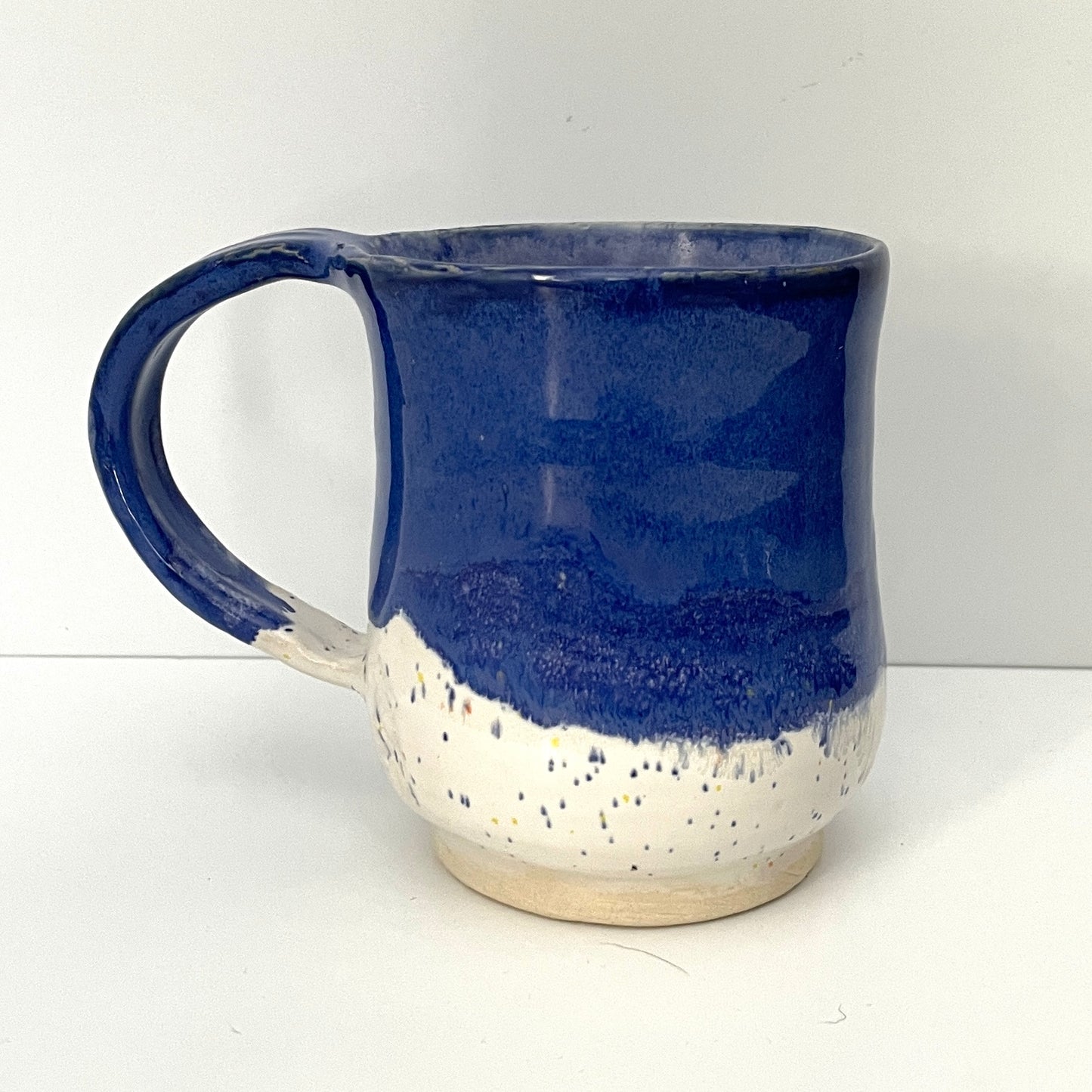 Deep blue and white speckled mug