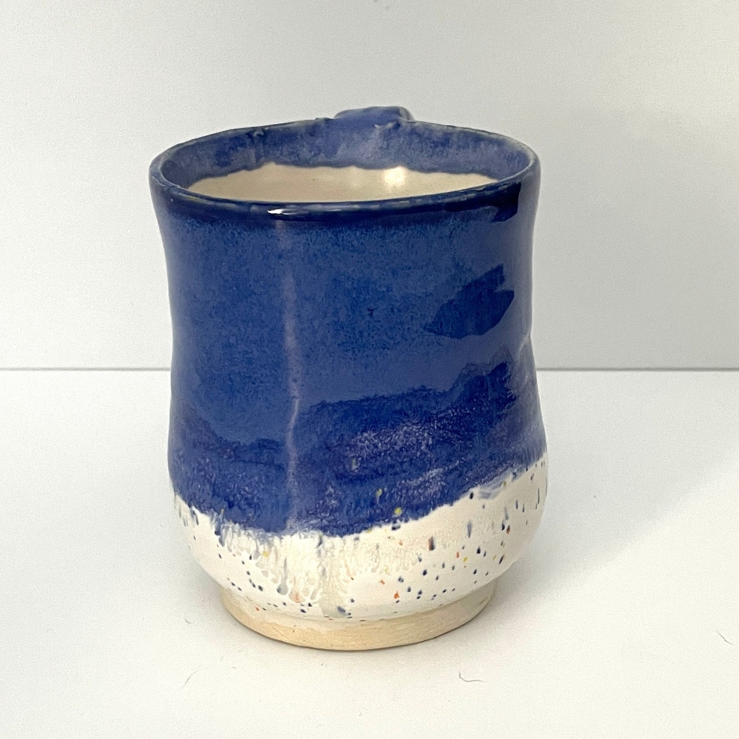 Deep blue and white speckled mug