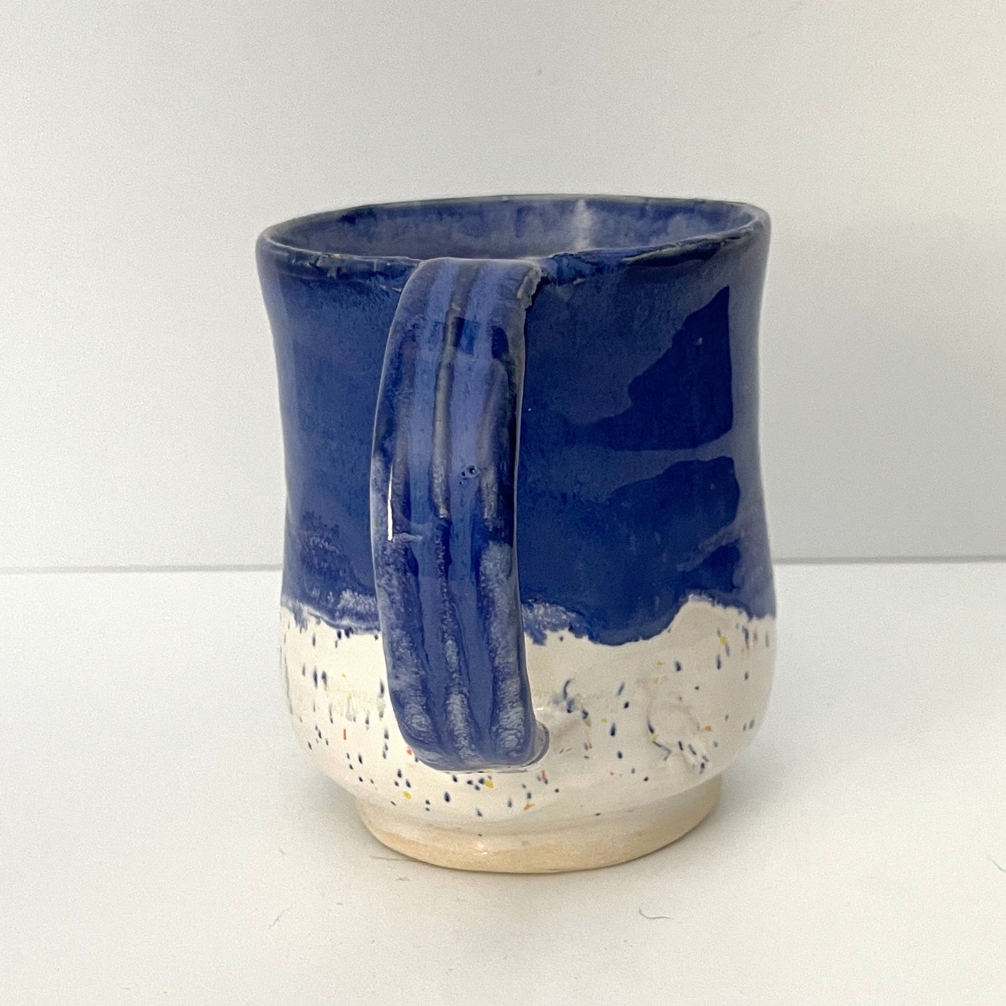 Deep blue and white speckled mug
