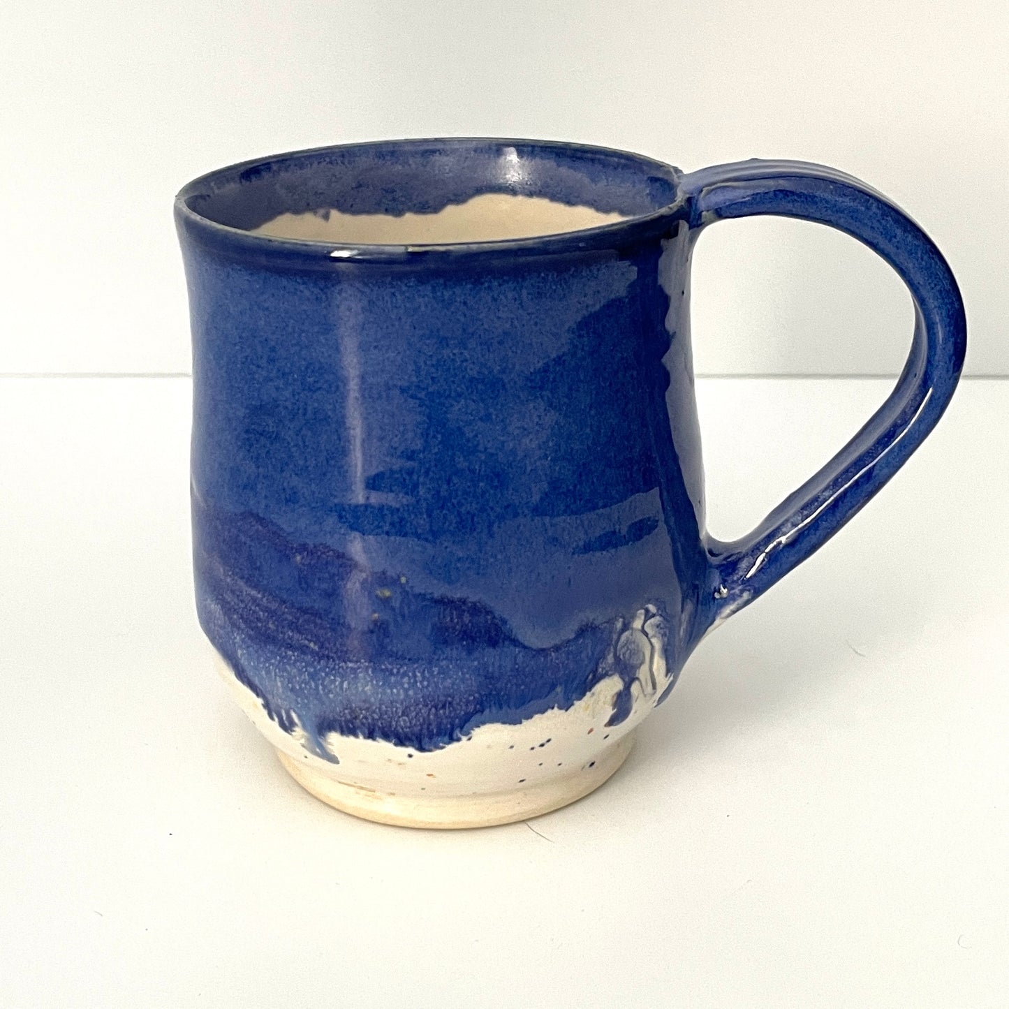 Deep blue and white speckled mug