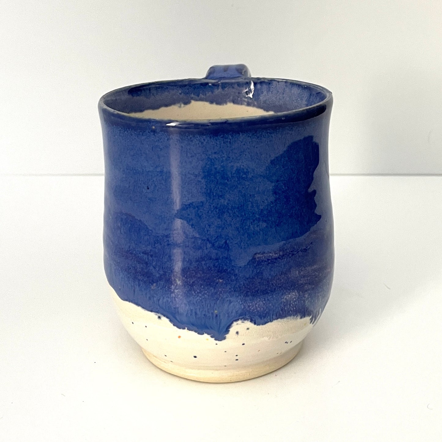 Deep blue and white speckled mug