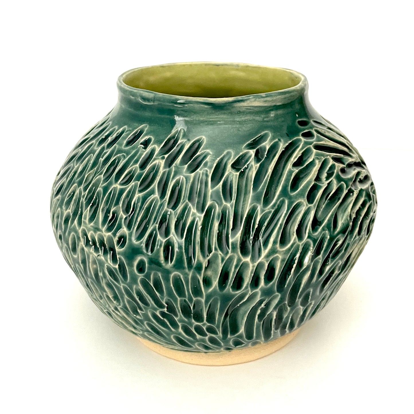 Deep green, low carved vase