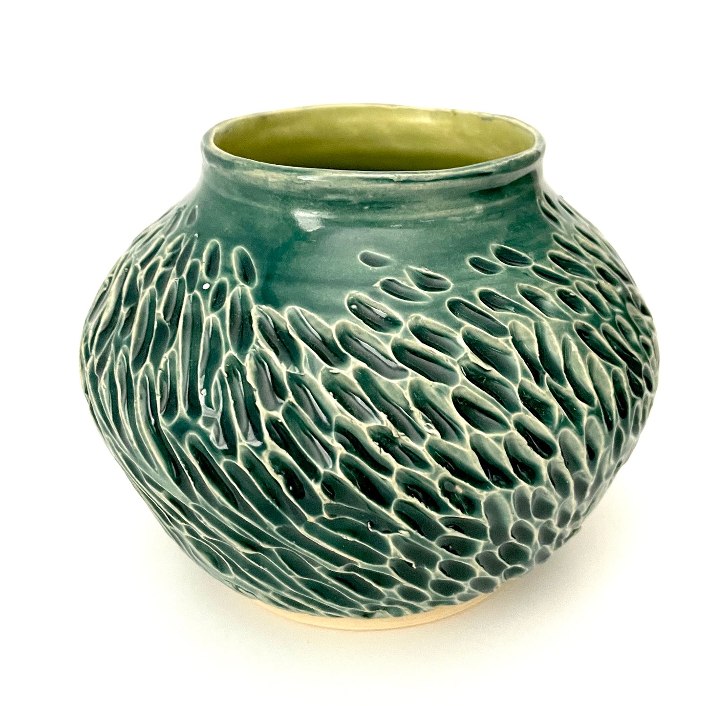 Deep green, low carved vase