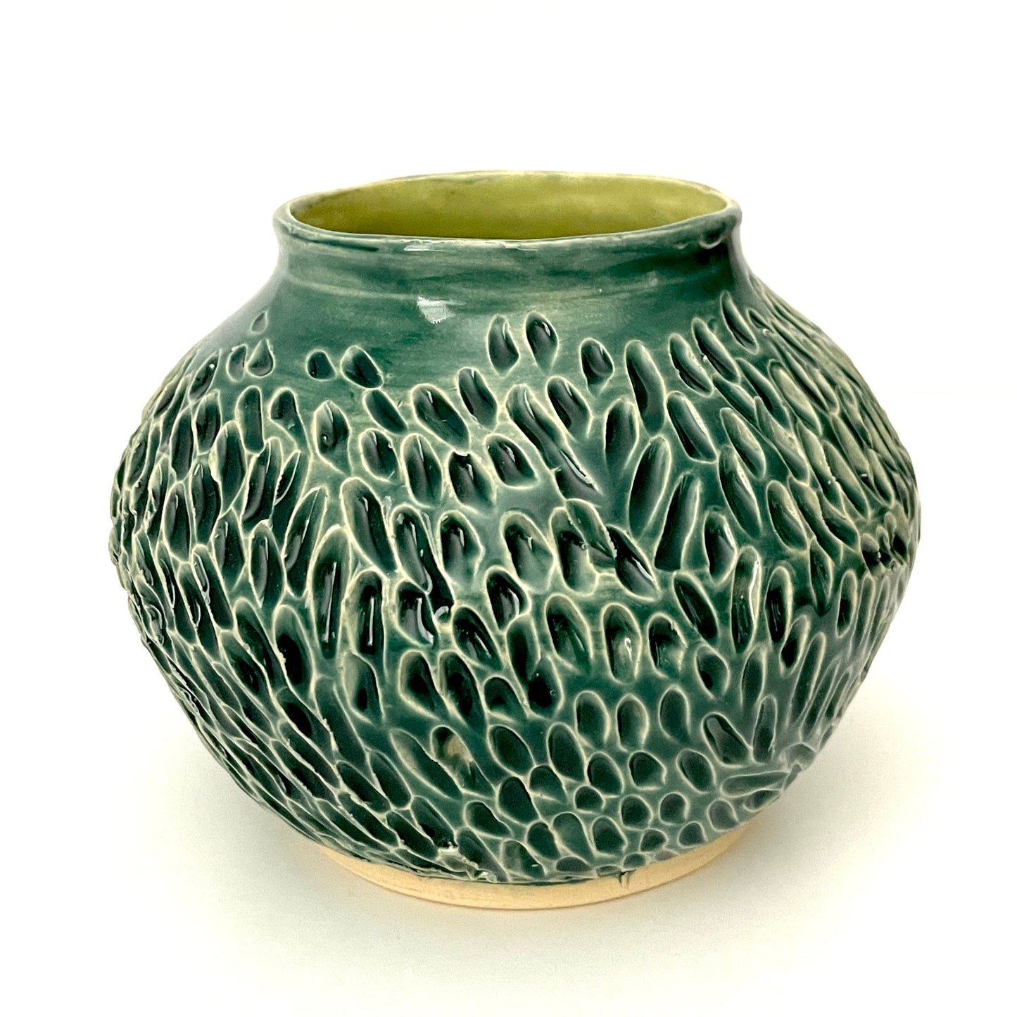 Deep green, low carved vase