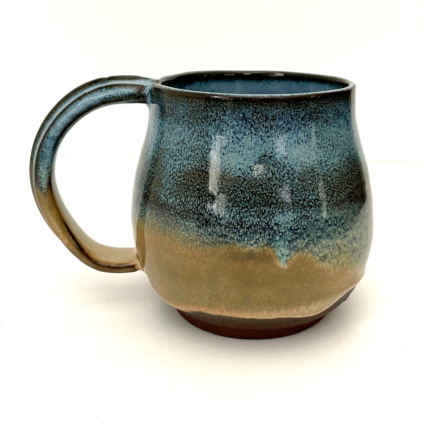 Blue and Cream mug on Dark Clay