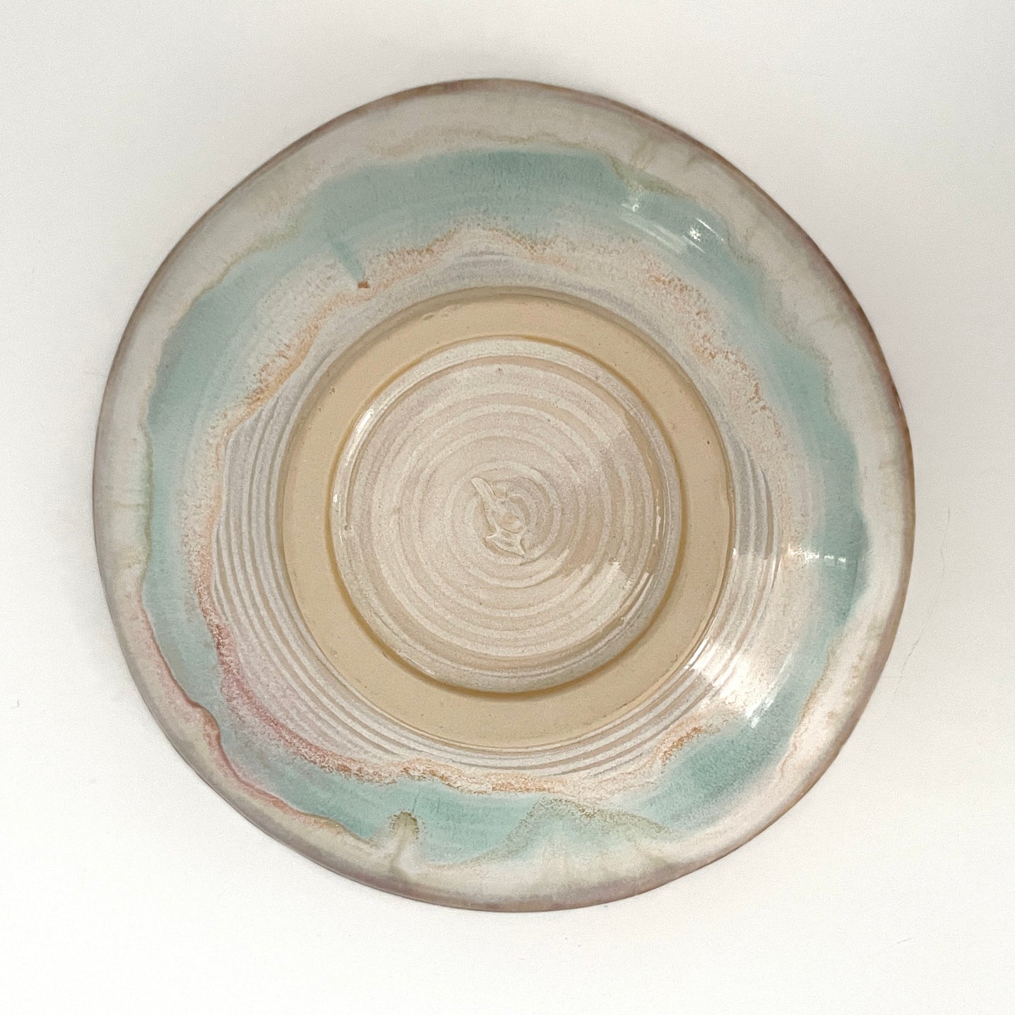 Dramatic serving or decorative bowl in white, seafoam green and rust,