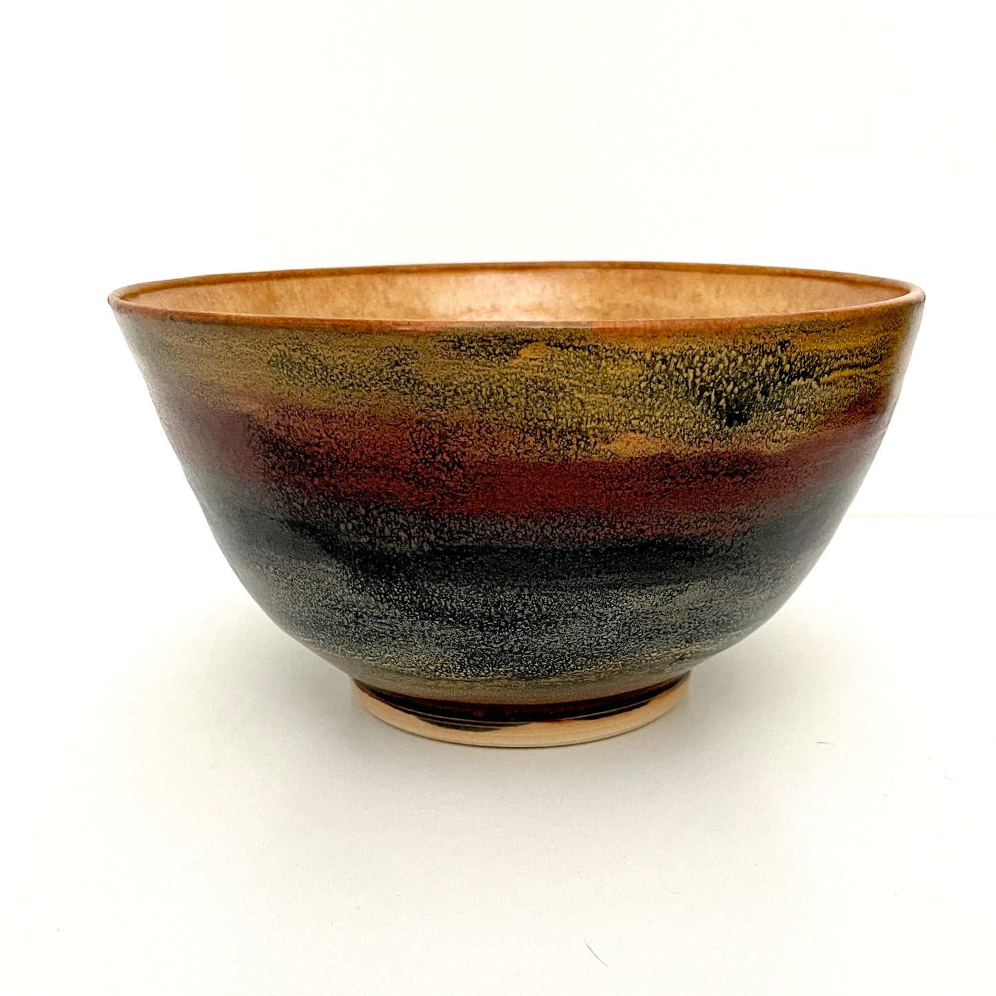 Large ceramic serving bowl in multicolor stripes and tones