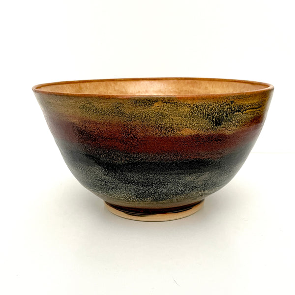 Large ceramic serving bowl in multicolor stripes and tones