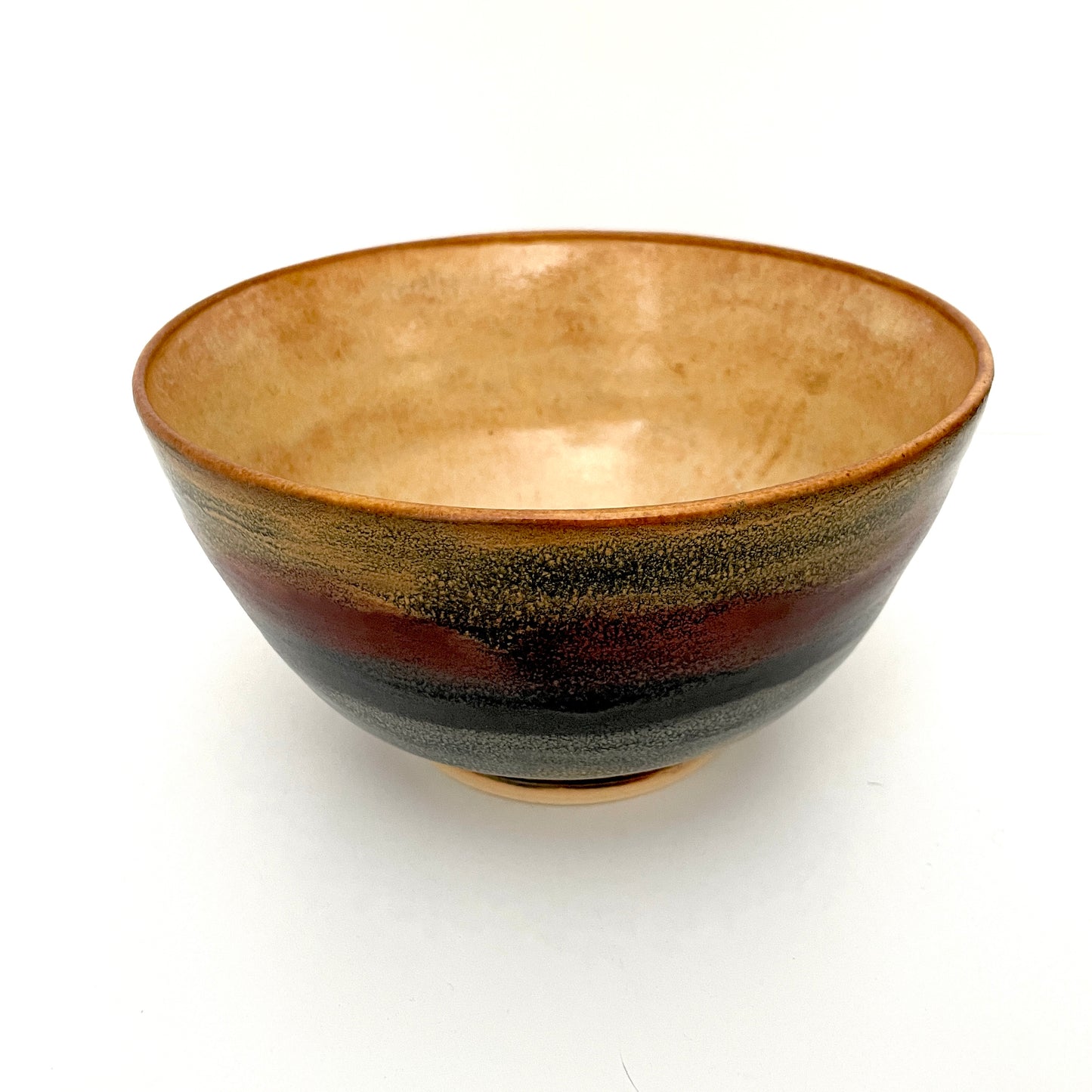 Large ceramic serving bowl in multicolor stripes and tones